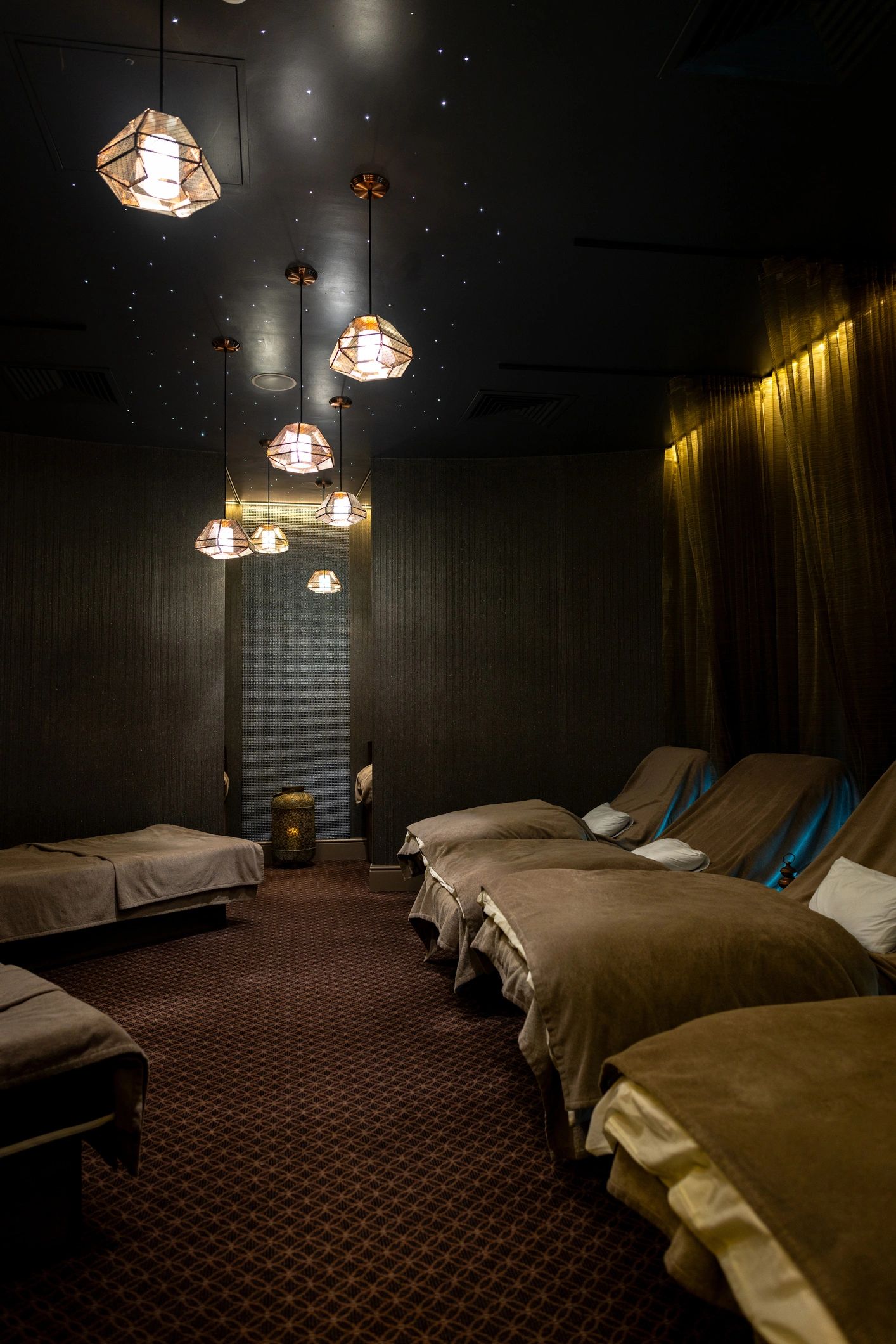 Calm luxury wellness setting with relaxation beds